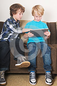 Kid working on a tablet computer