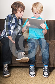 Kid working on a tablet computer