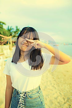 Kidding of asian teenager on summer vacation sea beach