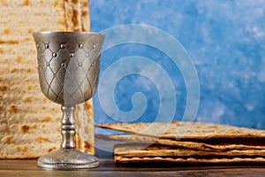 Kiddush cup of wine with matzos bread. Jewish pesah holiday