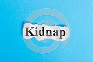 Kidnap text on paper. Word Kidnap on a piece of paper. Concept Image