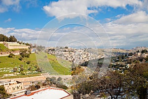 Kidron Valley in Jerusalem with snow and blue sky