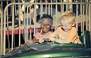 Kids on an amusement park ride