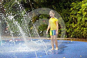 Kids at aqua park. Child in swimming pool.