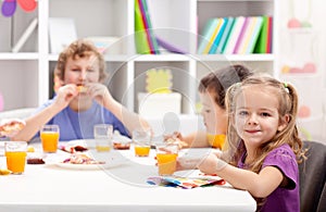 Kids around the table eating