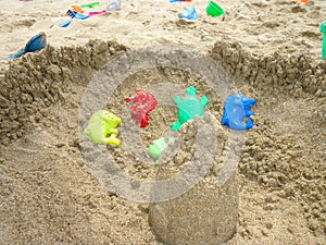 Kids beach toys at the beach. Holiday and summer concept.