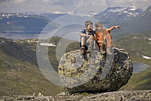 Kids on a big stone