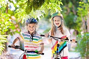 Kids on bike. Children on bicycle. Child biking