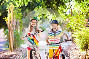 Kids on bike. Children on bicycle. Child biking