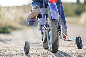 Kids bike with training wheels photo