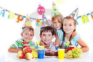 Kids with birthday cake