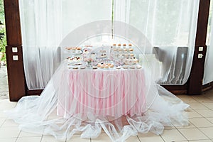 Kids birthday party decoration and cake. Decorated table