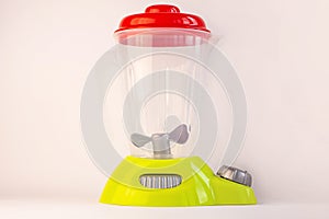 Kids blender on a white background. Childs food toy. Healthy eating, raw vegan diet, playing with babies.Healthy eating