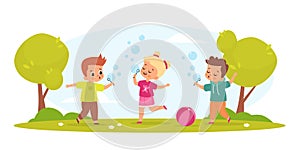 Kids blow bubbles. Funny boys and girl play with soap air balls outdoor in park, childish hobbies and games children