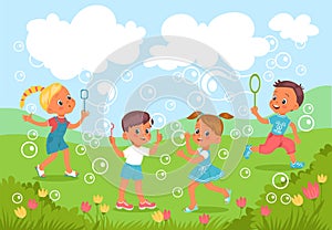 Kids blow bubbles. Happy carefree childhood. Boys and girls blowing soap spheres on green grass. Flying foam balls photo