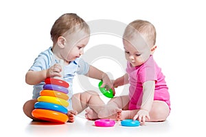 Kids boy and girl play toys together