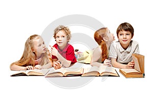 The kids boy and girls laying with books isolated on white