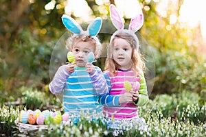 Kids with bunny ears on Easter egg hunt