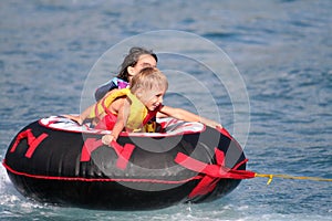 Kids on a buoy