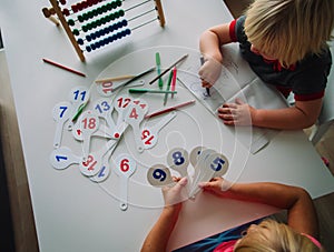 Kids calculate and learn numbers, children study math