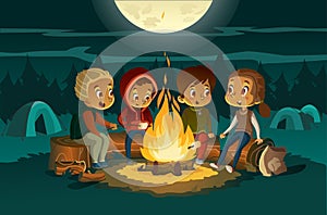 Kids camping in the forest at night near big fire. Children sitting in a circle, tell scary stories and roast photo