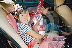 Kids can start wearing a regular seatbelt in car when kids are between 8 and 12 years old.