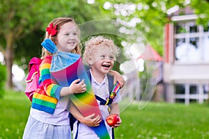 Kids with candy cone on first school day in Germany