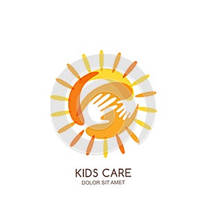 Kids care, family or charity logo emblem design template. Hand drawn sun with baby and adult hands silhouettes. photo