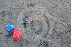 Kids castle and toys in sand