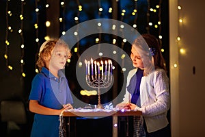 Kids celebrating Hanukkah. Festival of lights