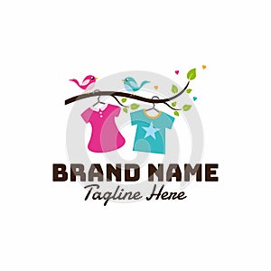 Kids clothing store logo with clothes hanging on a branch