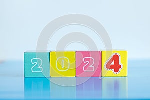 Kids' colorful cube toys with the numbers 2024