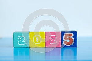 Kids' colorful cube toys with the numbers 2025