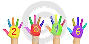 Kids colorful hands forming number 2016.