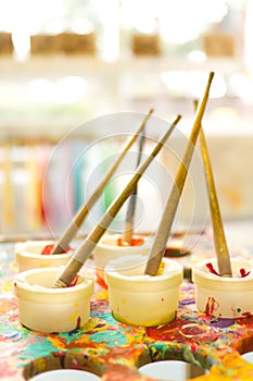 Kids colorful paint brushes for art photo