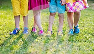 Kids with colorful shoes. Children footwear