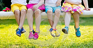 Kids with colorful shoes. Children footwear