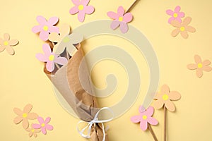 Kids crafts bouquet of flowers made of colored cardboard. Happy Mothers Day concept