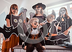 Kids in creepy Halloween costumes have fun