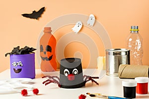 Kids DIY Halloween home activities. Handmade monster, spider and pumpkin. Reuse art from tin can, plastic bottle and cup