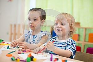 Kids doing arts and crafts in day care centre