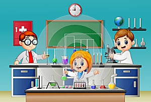 Kids doing experiment in the lab