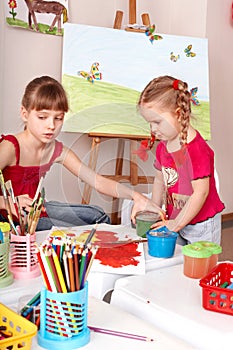 Kids drawing colour pencil in play room.