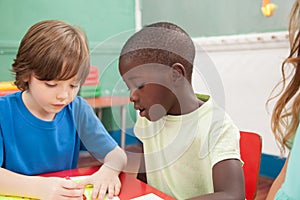 Kids drawing in the kindergarten