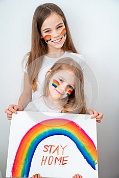 Kids drew rainbow and poster stay home. photo