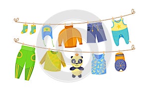 Kids dry clothes on clothesline vector cartoon illustration