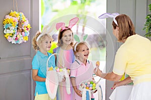 Kids Easter egg hunt. Child and eggs, bunny ears