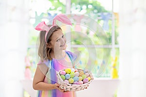 Kids on Easter egg hunt. Children dye eggs