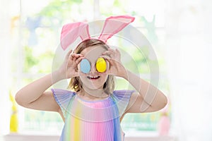 Kids on Easter egg hunt. Children dye eggs