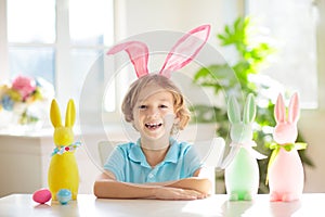 Kids on Easter egg hunt. Children dye eggs